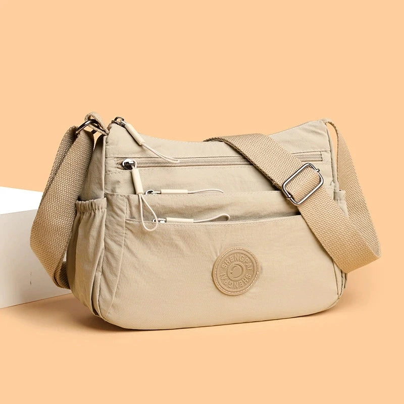 sac besace bandouliere femme en nylon beige