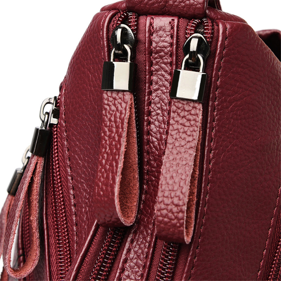 details du sac bandouliere bordeaux femme avec poches
