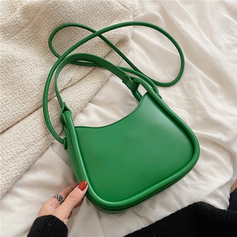 sac bandouliere vert en cuir synthétique