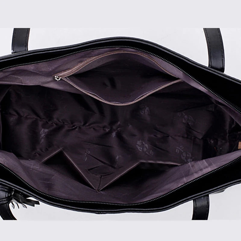 interieur du sac a main fourre tout noir