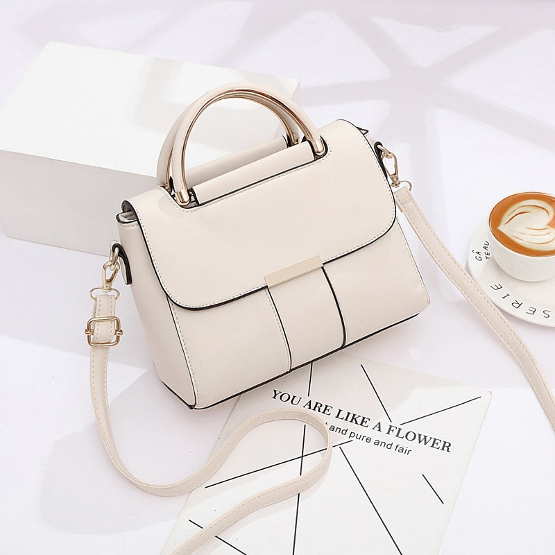 sac a main bandouliere  blanc en cuir