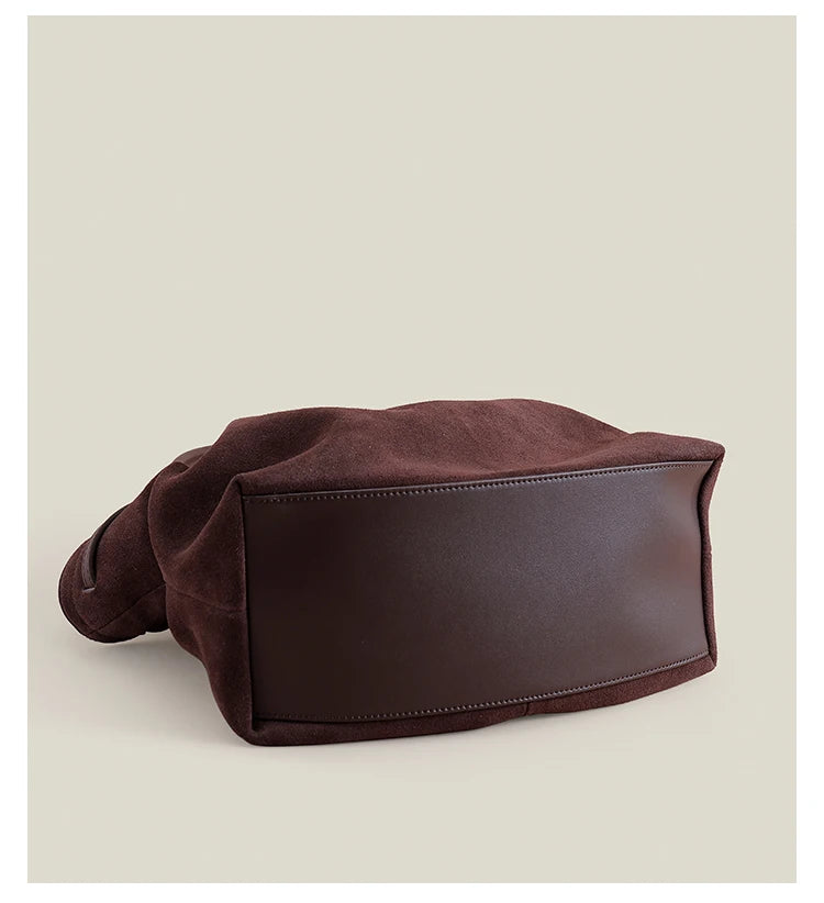 dessous du grand sac en cuir brosse femme