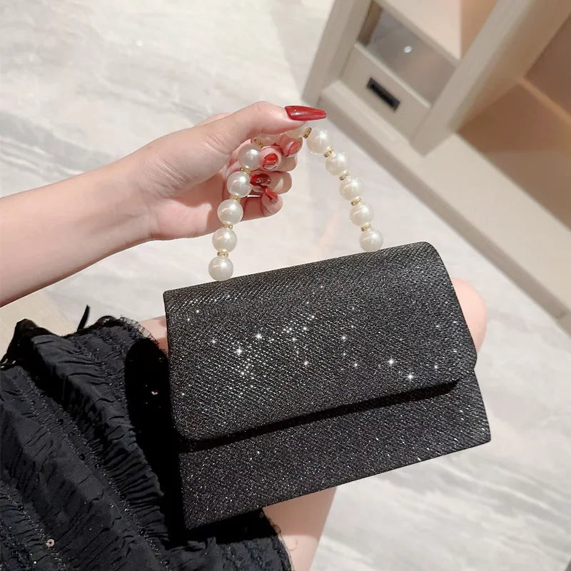 Sac pochette noir pailleté