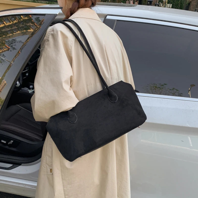 sac epaule noir en suedine