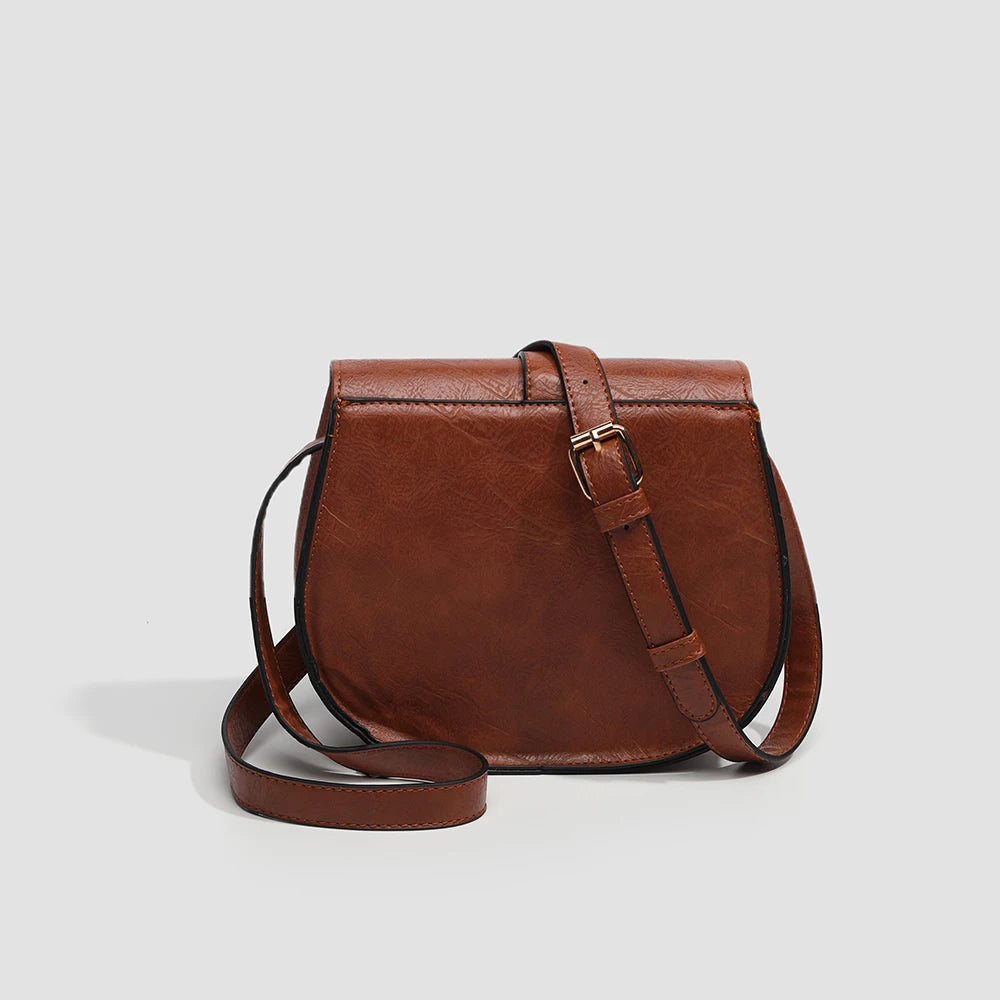 dos du sac bandouliere marron