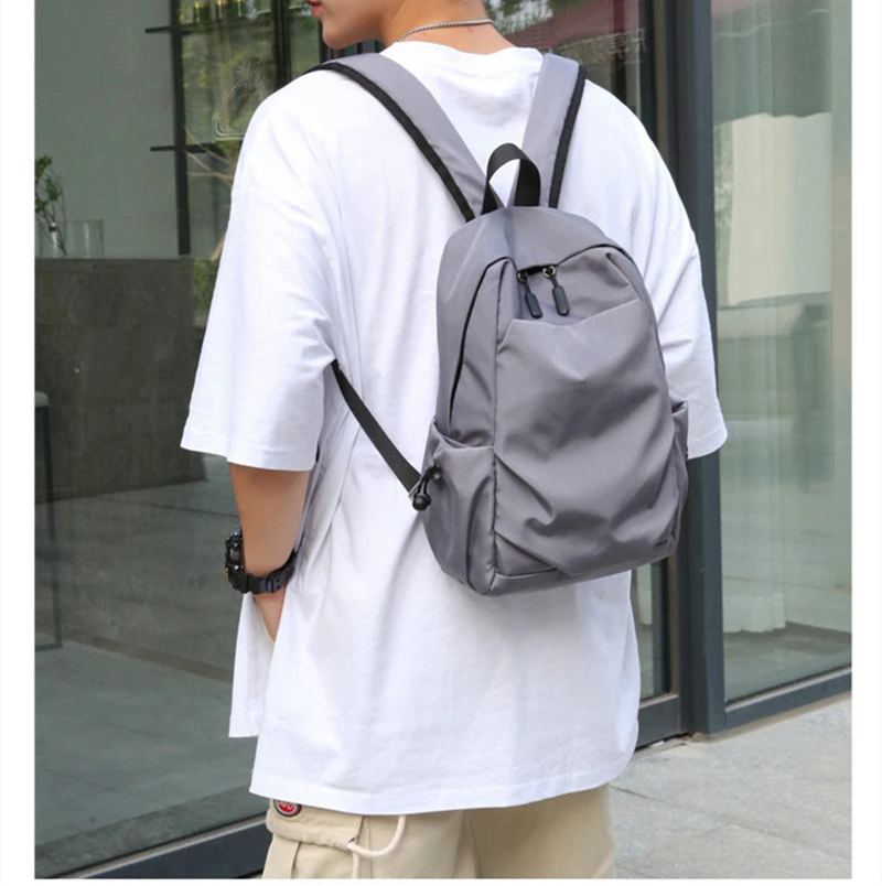 sac a dos compact pour homme gris