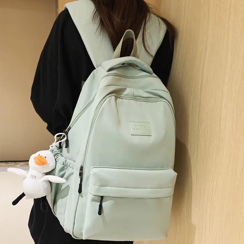 sac a dos de cours porte vert