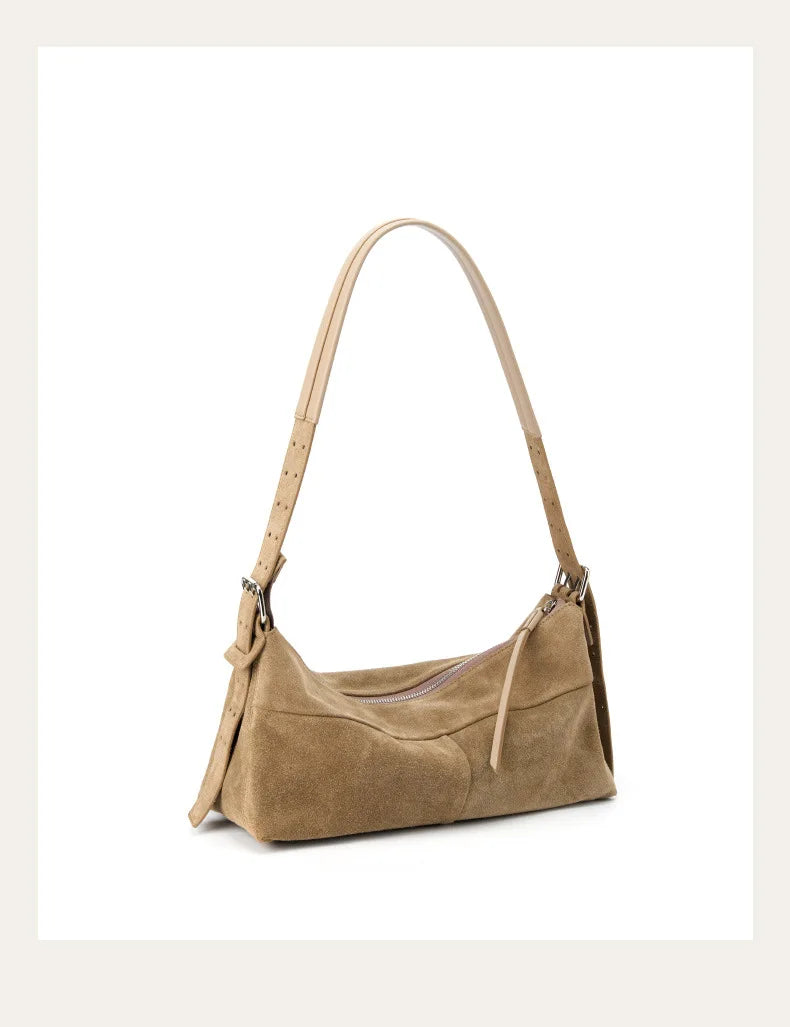 Sac femme en daim beige avec sa tirette en cuir