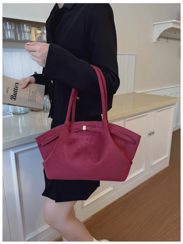 sac a main suede bras framboise