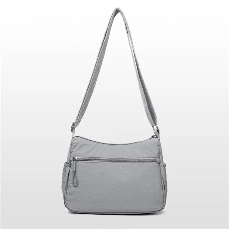 dos du sac besace bandouliere femme en nylon gris