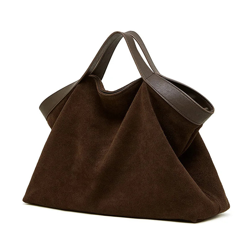 Grand sac en daim café avec anses en cuir, vue de trois quarts