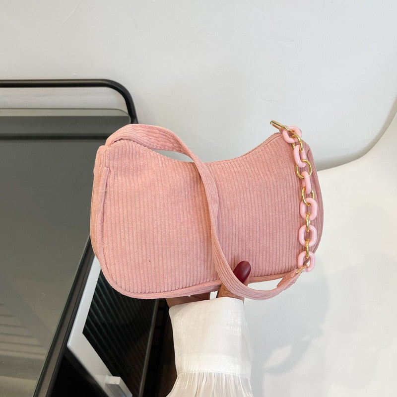 sac en velours cotelé rose avec chaine