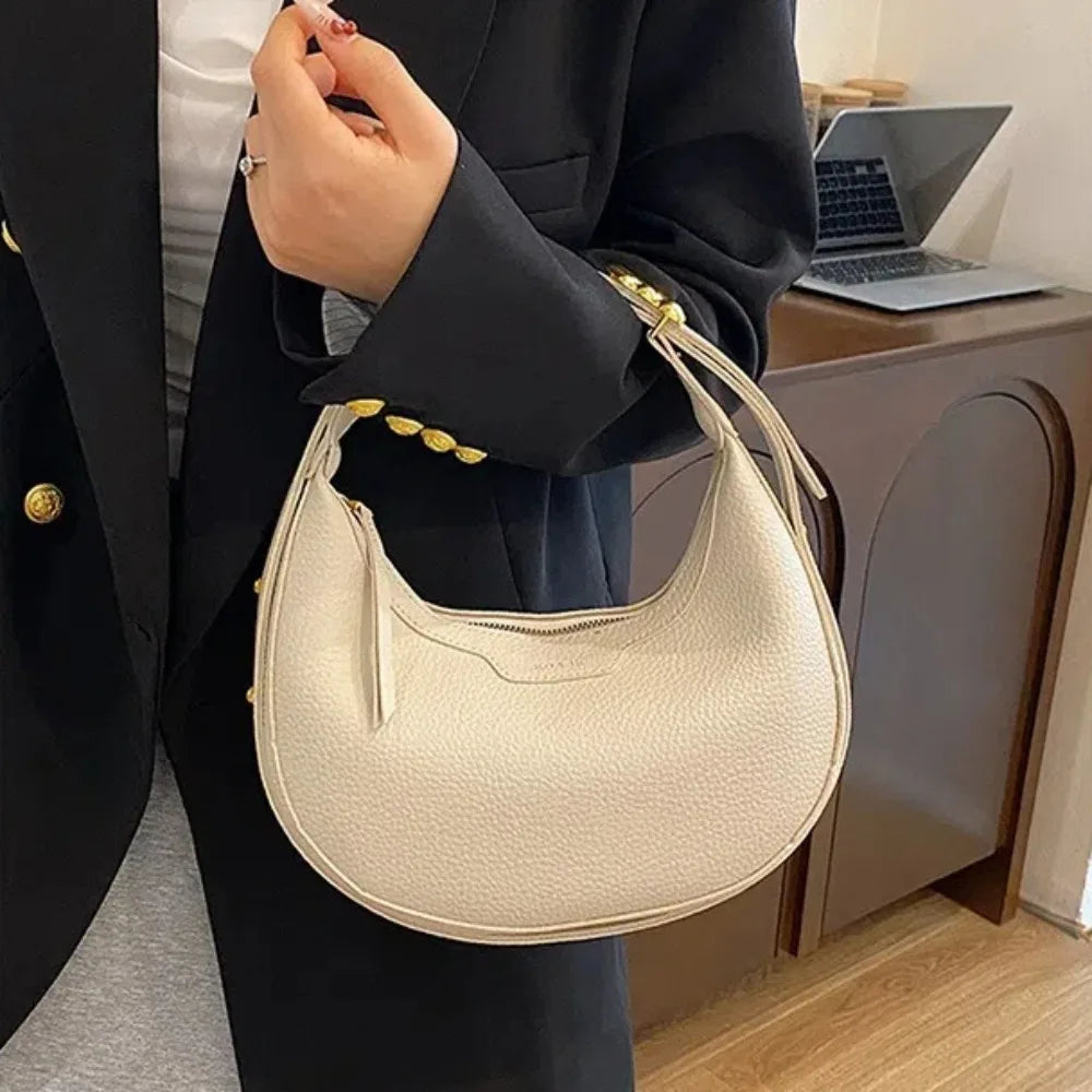 sac a main rond poignet femme