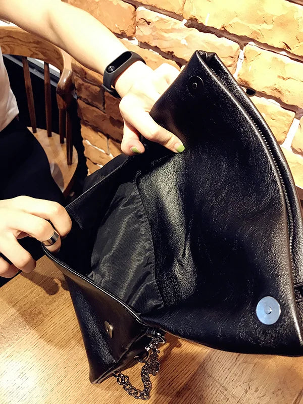 Intérieur doublé noir de la pochette pliable