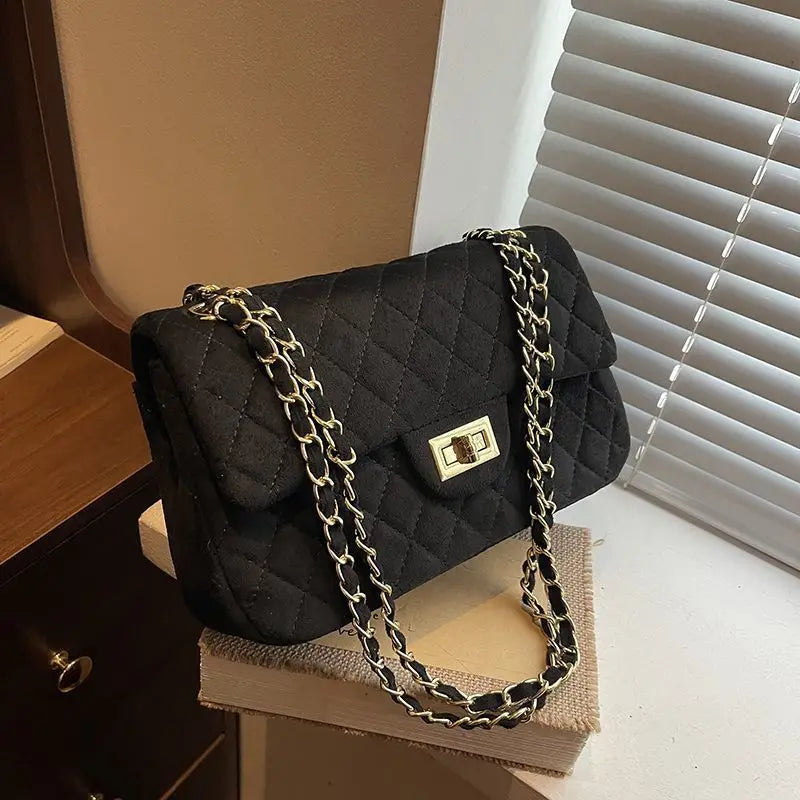 sac bandouliere avec chaine noir matelasse