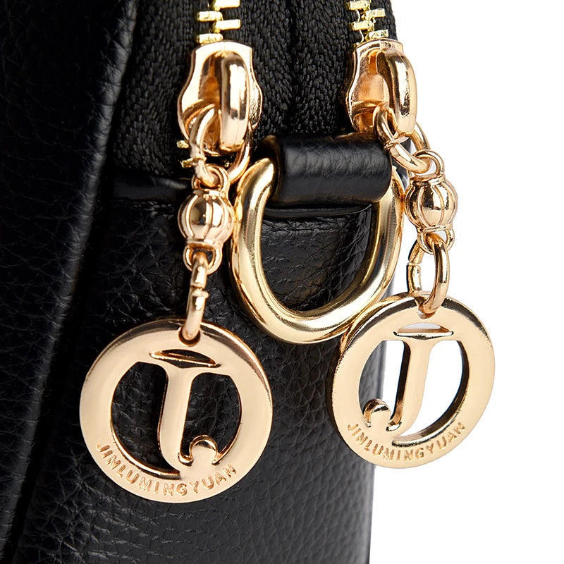 détails du sac a bandouliere noir en similicuir