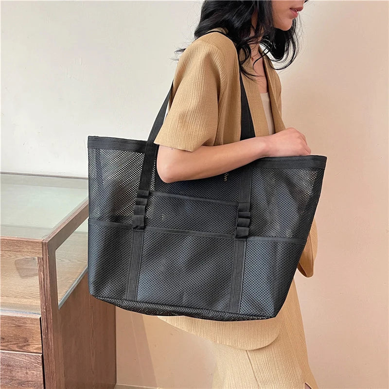 sac de plage en maille porte epaule