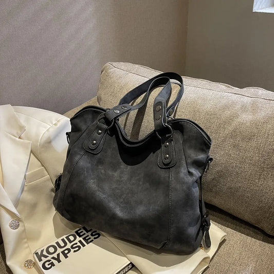 sac a main en daim noir