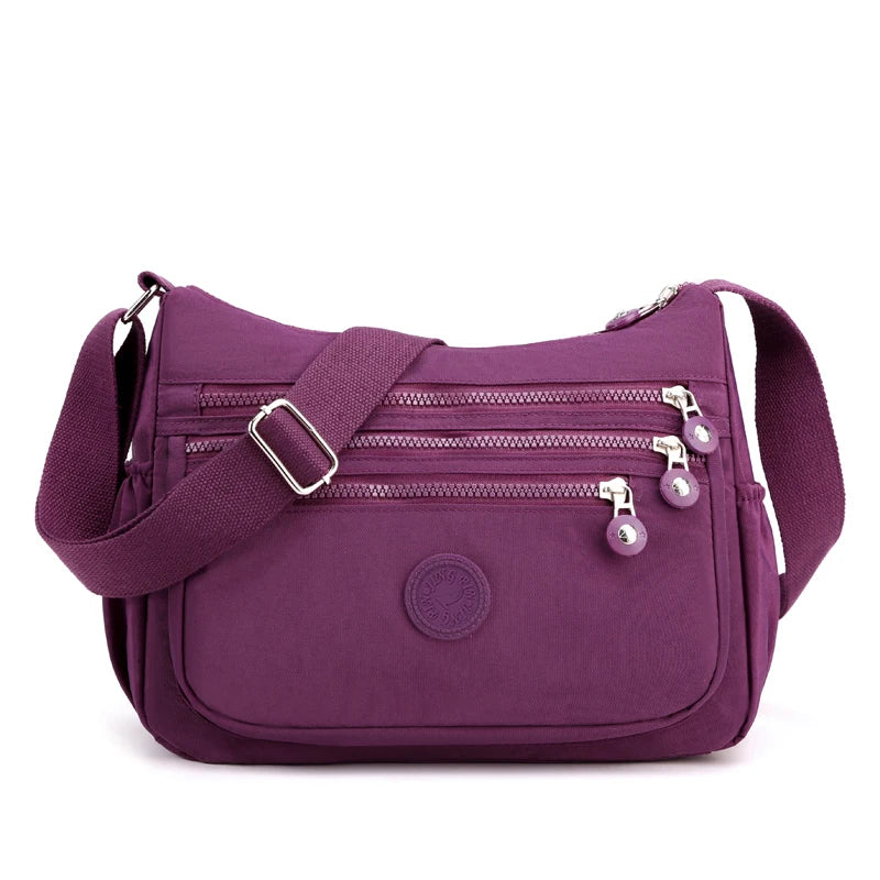 sac bandouliere nylon a poches violet