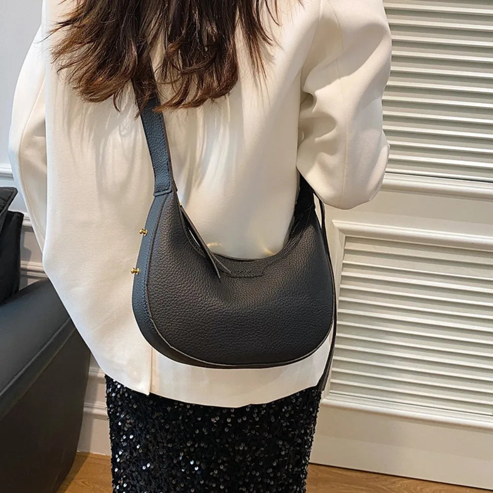 sac a main rond noir bandouliere
