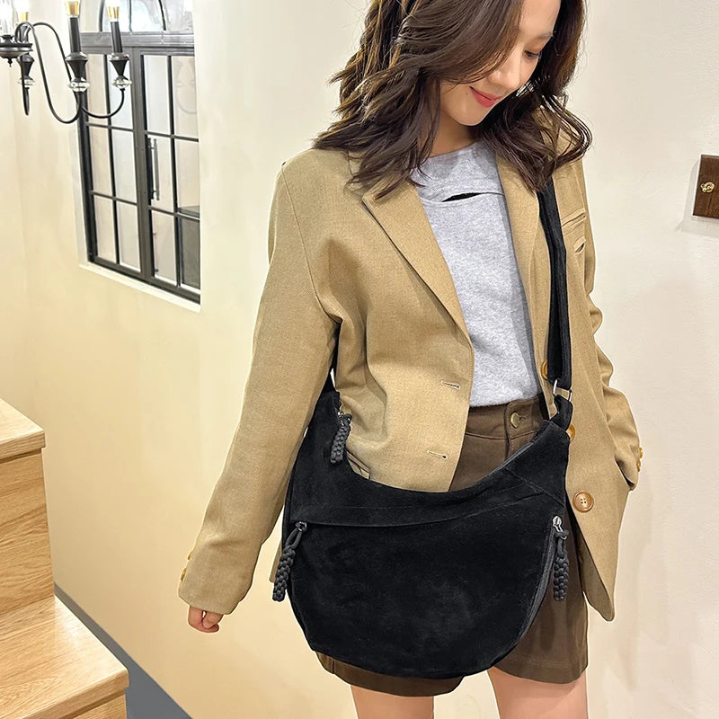 sac besace noir en daim porte bandouliere