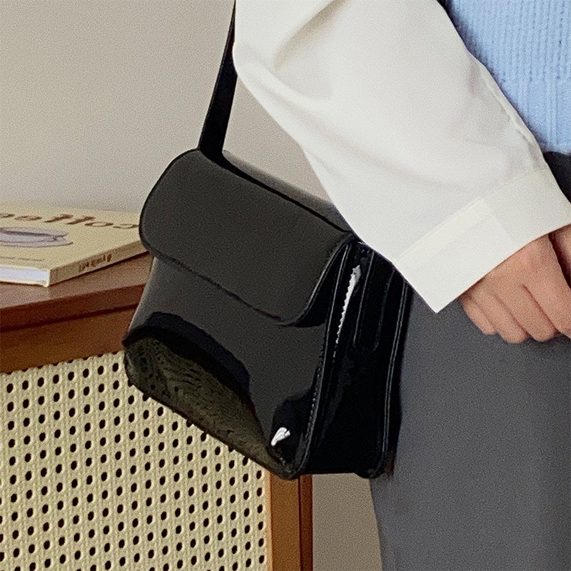 sac a main noir brillant elegant