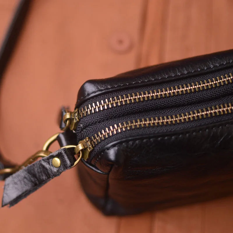 pochette en bandouliere homme compartiment zippe