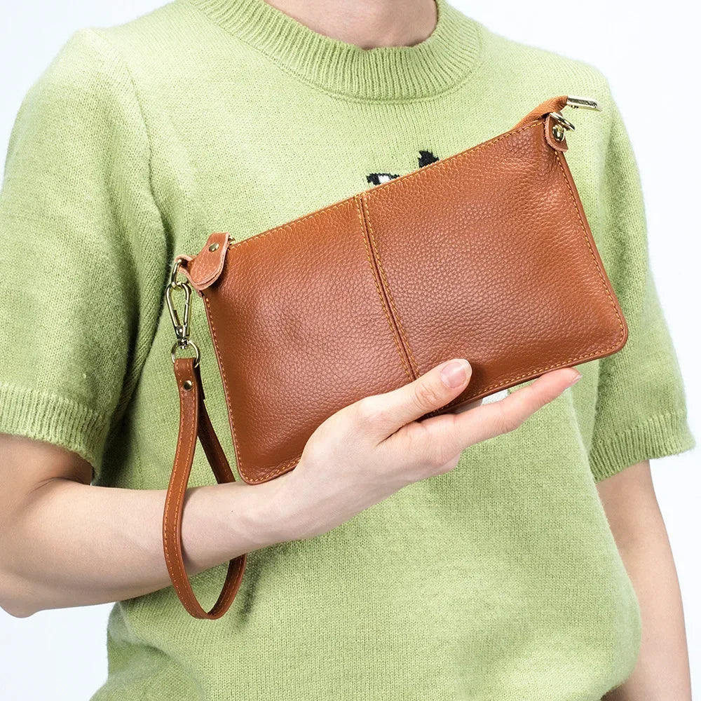 sac bandoulière rectangle porté à la main