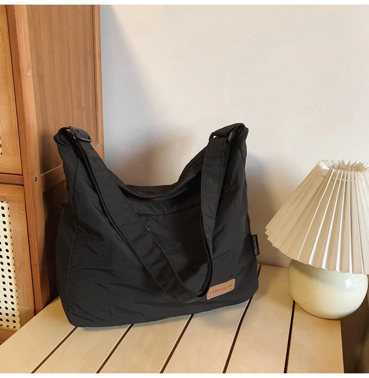 sac besace en toile noir