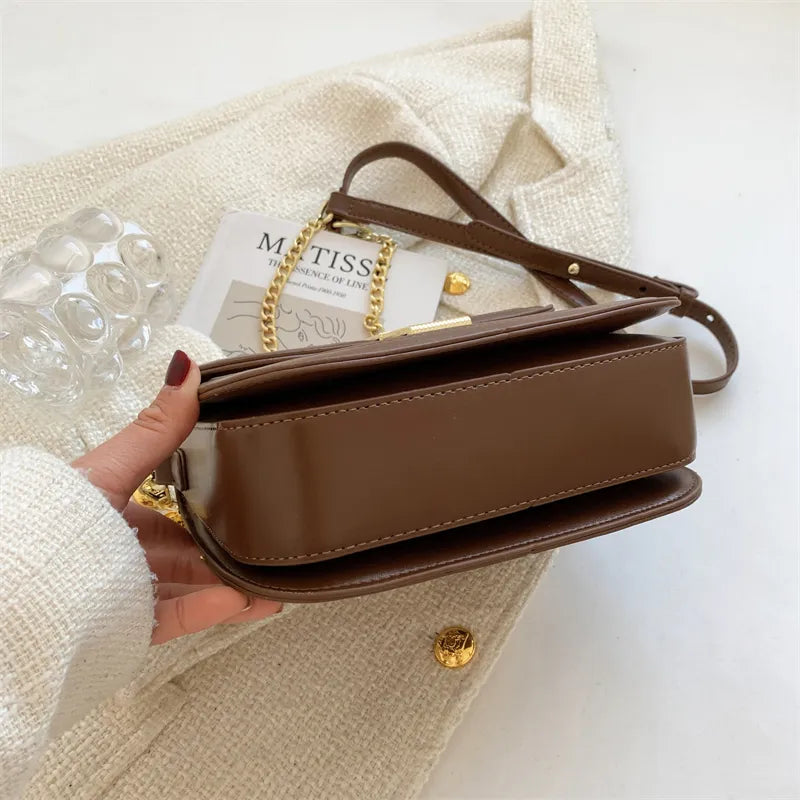 dessous du sac bandouliere toile et cuir