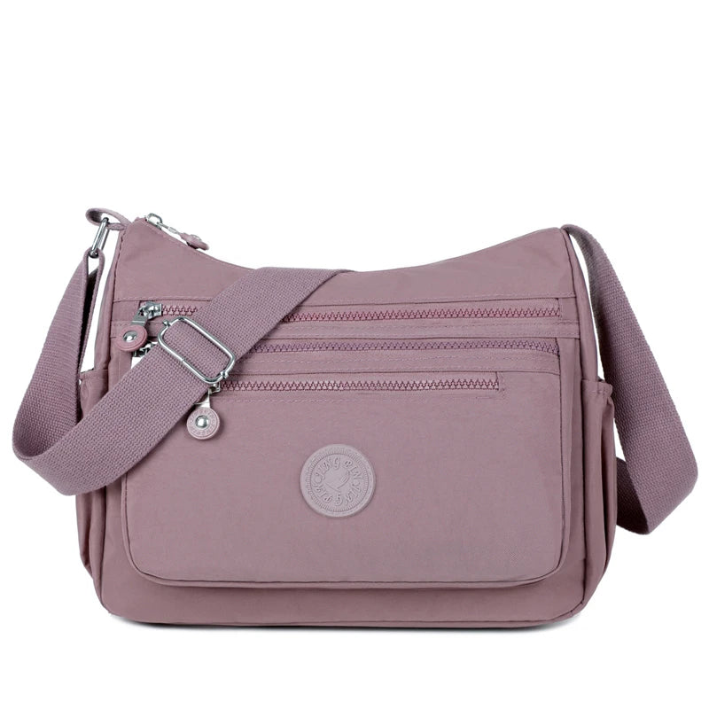 sac bandouliere en nylon parme