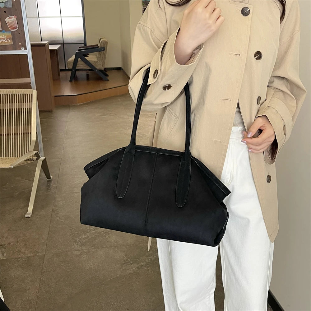 sac a main en suedine noir chic