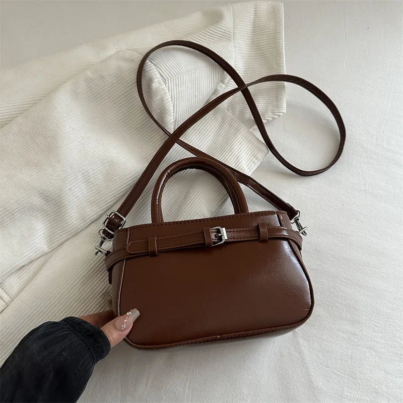 petit sac a main marron chaud