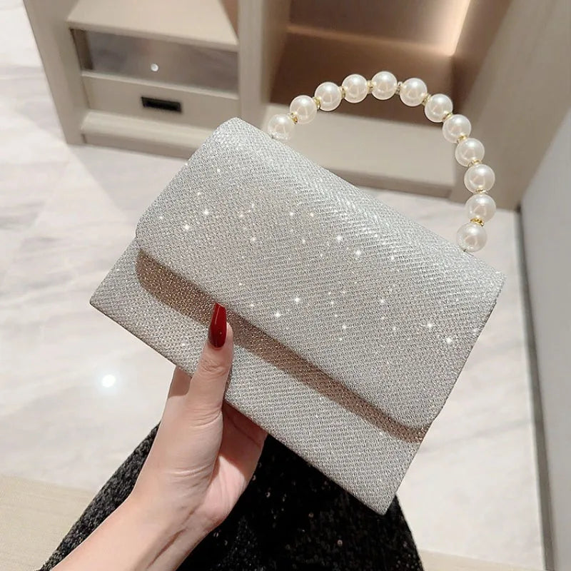 Sac pochette pour mariage argenté avec anse en perles 