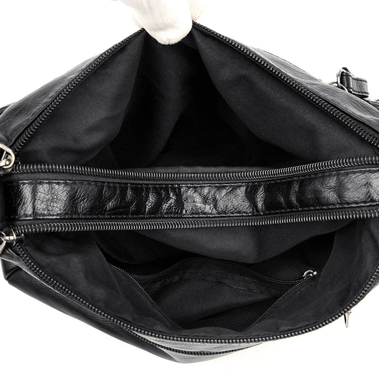 interieur du grand sac bandouliere noir tendance