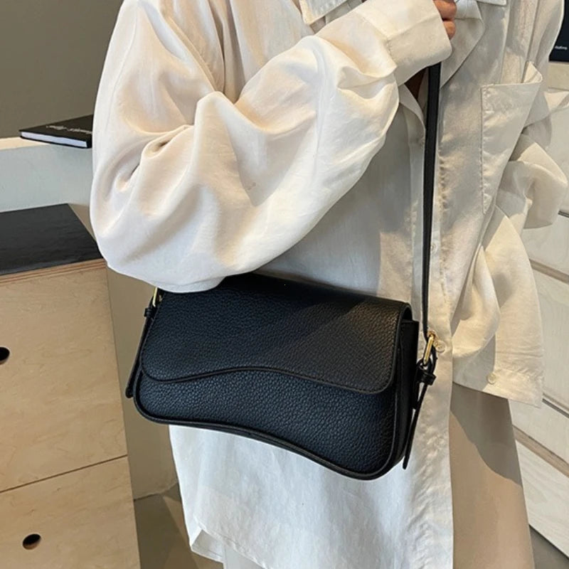 petit sac a main noir porte croise