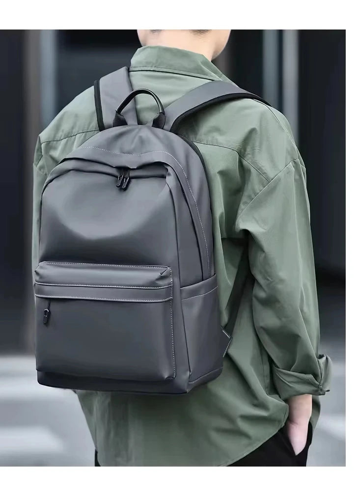 sac a dos gris pour ordinateur homme