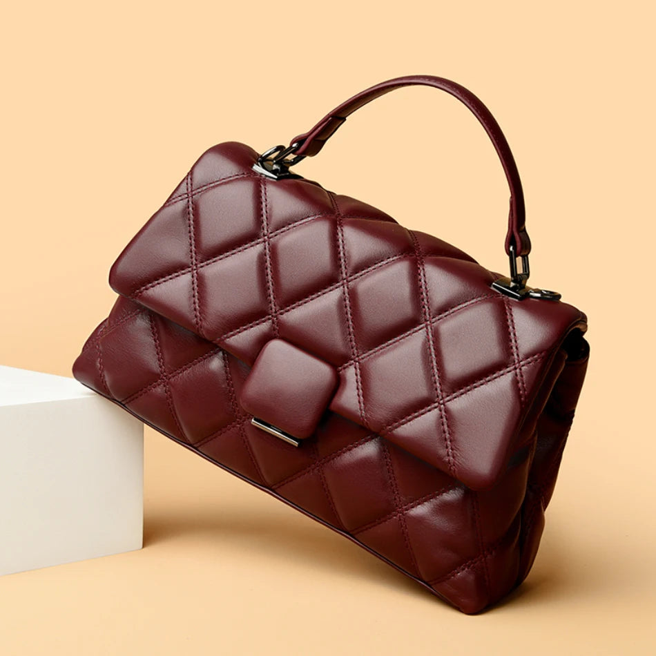 sac a main capitonne avec bandouliere bordeau