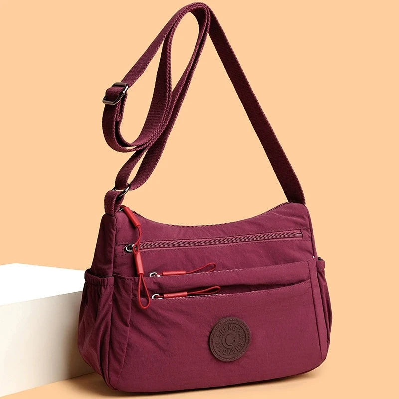 sac besace bandouliere femme en nylon bordeaux