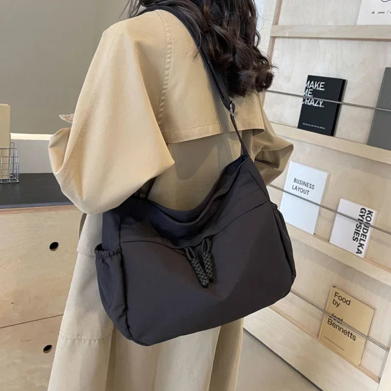 sac besace femme tissu noir