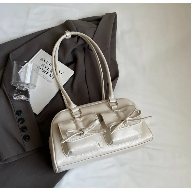 sac multipoches crème