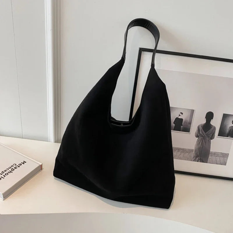 sac besace en daim noir