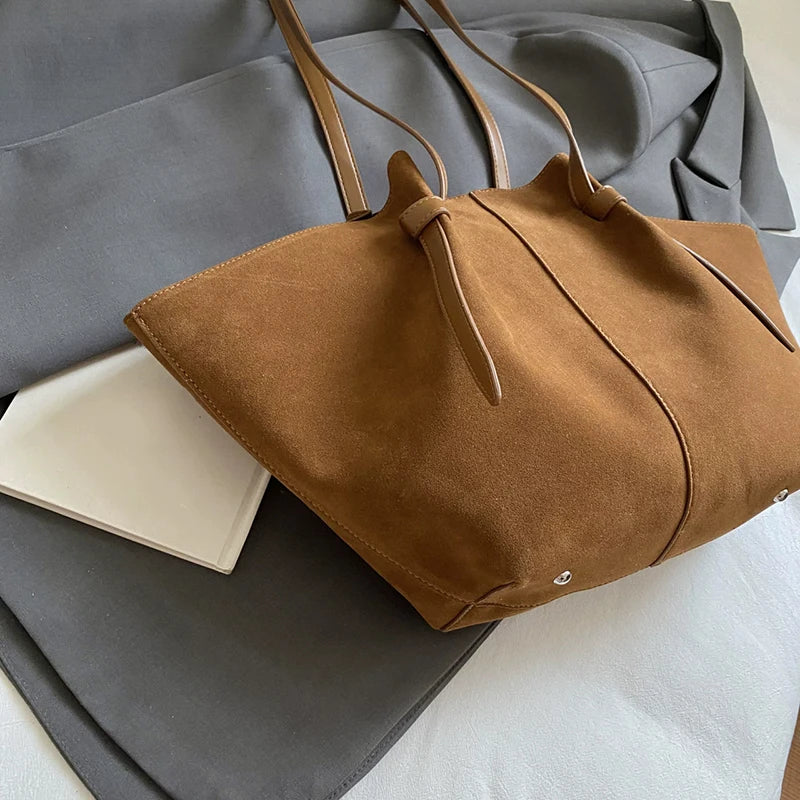 sac trapeze en daim